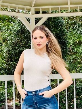 Sleeveless Crewneck bodysuit in Cream